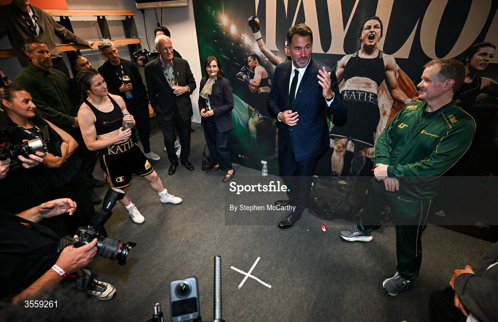 5 September 2026; Katie Taylor, left, Matchroom Boxing promoter Eddie Hearn, centre, and manager of Katie Taylor Brian Peters after her undisputed super lightweight championship fight with Flora Pili at the Once Upon A Time fight night in Croke Park, Dublin. Photo by Stephen McCarthy/Sportsfile