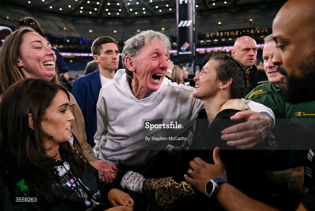 5 September 2026; Katie Taylor with a supporter after her undisputed super lightweight championship fight with Flora Pili at the Once Upon A Time fight night in Croke Park, Dublin. Photo by Stephen McCarthy/Sportsfile