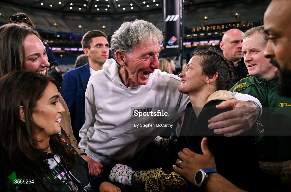 5 September 2026; Katie Taylor with supporter Brian McCann after her undisputed super lightweight championship fight with Flora Pili at the Once Upon A Time fight night in Croke Park, Dublin. Photo by Stephen McCarthy/Sportsfile