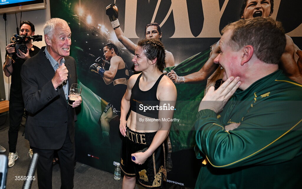 5 September 2026; Katie Taylor, centre, with president of Matchroom Sport Barry Hearn, left, and manager manager Brian Peters after her undisputed super lightweight championship fight with Flora Pili at the Once Upon A Time fight night in Croke Park, Dublin. Photo by Stephen McCarthy/Sportsfile