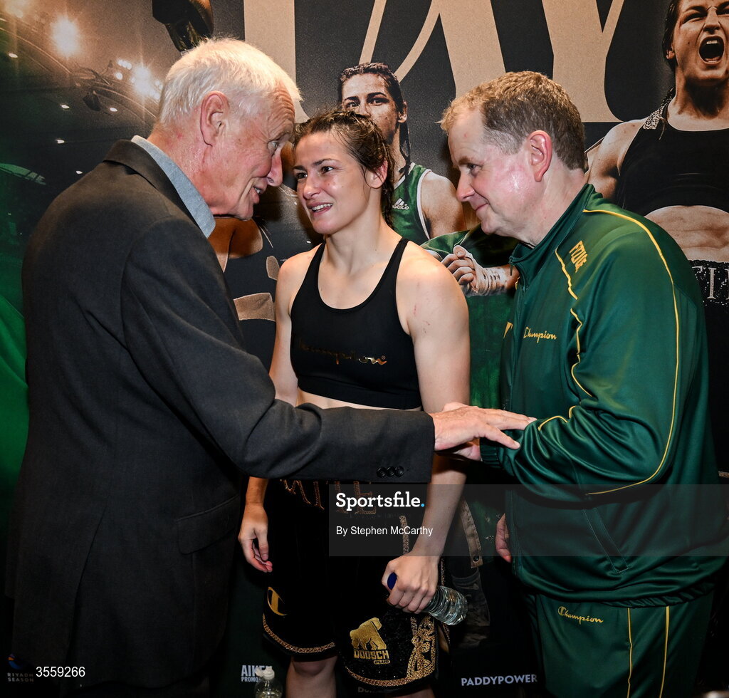 5 September 2026; Katie Taylor, centre, with president of Matchroom Sport Barry Hearn, left, and manager manager Brian Peters after her undisputed super lightweight championship fight with Flora Pili at the Once Upon A Time fight night in Croke Park, Dublin. Photo by Stephen McCarthy/Sportsfile