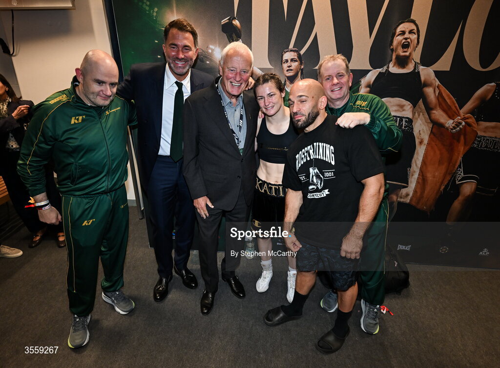 5 September 2026; Katie Taylor, third from right, with from left, advisor of Katie Taylor, Tomás Rohan, Matchroom Boxing promoter Eddie Hearn, president of Matchroom Sport Barry Hearn, trainer Ross Enamait and manager Brian Peters after her undisputed super lightweight championship fight with Flora Pili at the Once Upon A Time fight night in Croke Park, Dublin. Photo by Stephen McCarthy/Sportsfile