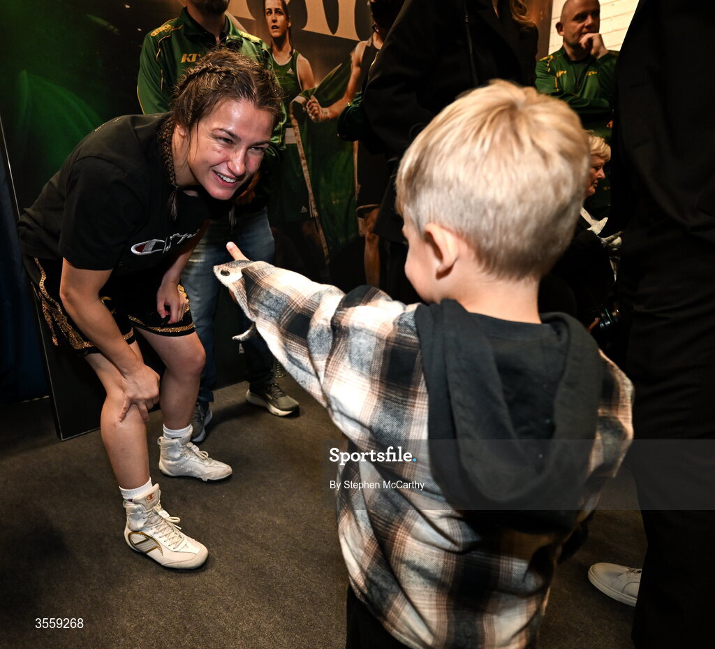 5 September 2026; Katie Taylor with a supporter after her undisputed super lightweight championship fight with Flora Pili at the Once Upon A Time fight night in Croke Park, Dublin. Photo by Stephen McCarthy/Sportsfile