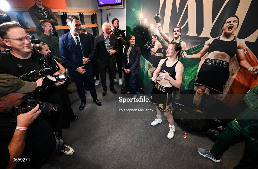 5 September 2026; Katie Taylor, right, with Matchroom Boxing promoter Eddie Hearn, centre left, and president of Matchroom Sport Barry Hearn after her undisputed super lightweight championship fight with Flora Pili at the Once Upon A Time fight night in Croke Park, Dublin. Photo by Stephen McCarthy/Sportsfile