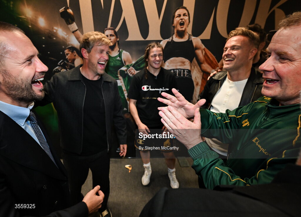 5 September 2026; Katie Taylor in her dressing room with, from left, Matchroom Boxing CEO Frank Smith, Kian Egan and Nicky Byrne of Westlife and Brian Peters, Katie Taylor's manager, following her undisputed super lightweight championship fight victory over Flora Pili at the Once Upon A Time fight night in Croke Park, Dublin. Photo by Stephen McCarthy/Sportsfile