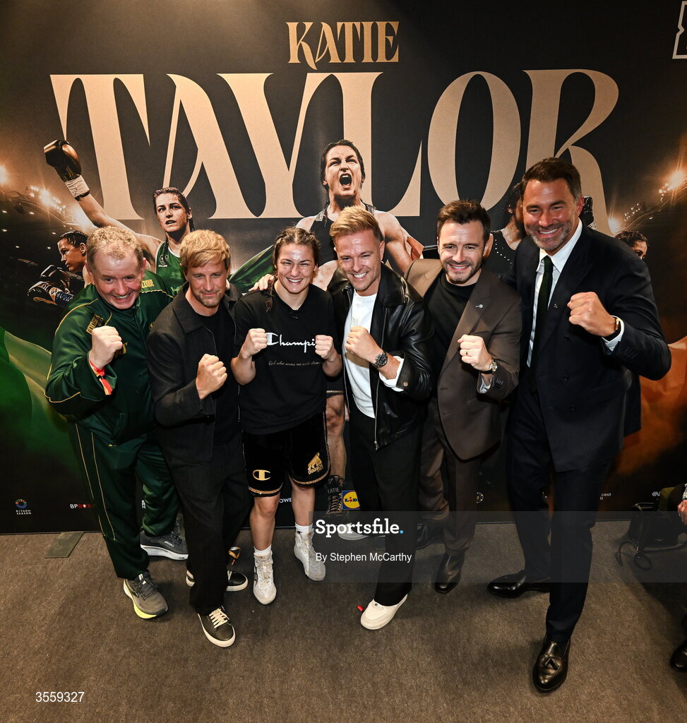 5 September 2026; Katie Taylor in her dressing room, with from left, manager Brian Peters, Kian Egan, Nicky Byrne and Shane Filan of Westlife, and Matchroom Boxing promoter Eddie Hearn following her undisputed super lightweight championship fight victory over Flora Pili at the Once Upon A Time fight night in Croke Park, Dublin. Photo by Stephen McCarthy/Sportsfile