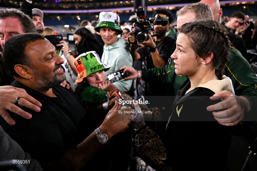 5 September 2026; Katie Taylor is presented with a belt by Prince Naseem Hamed following her undisputed super lightweight championship fight victory over Flora Pili at the Once Upon A Time fight night in Croke Park, Dublin. Photo by Stephen McCarthy/Sportsfile
