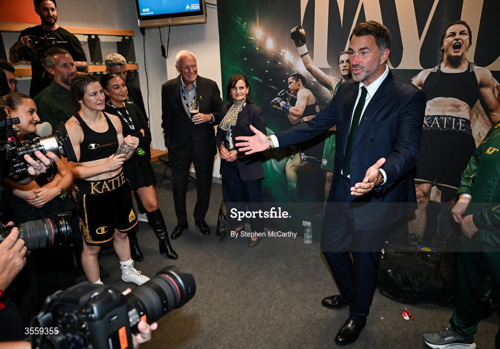 5 September 2026; Chairman of Matchroom Sports Eddie Hearn speaks to Katie Taylor in her dressing room following her undisputed super lightweight championship fight victory over Flora Pili at the Once Upon A Time fight night in Croke Park, Dublin. Photo by Stephen McCarthy/Sportsfile