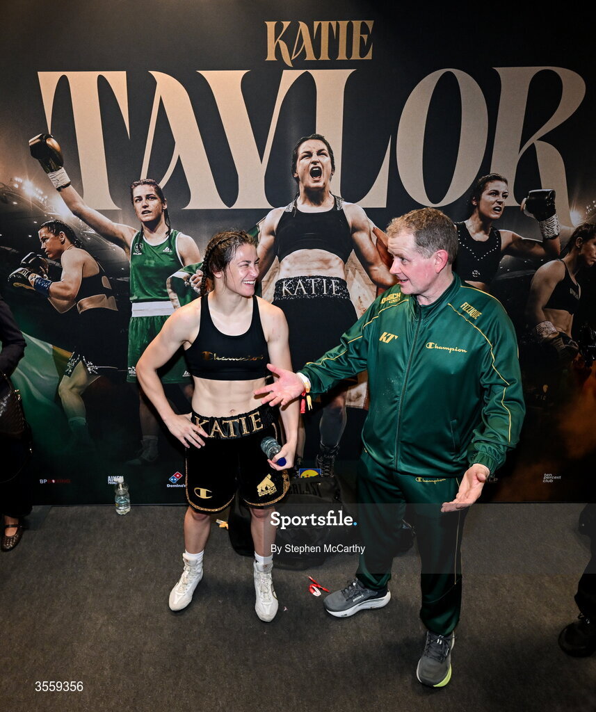 5 September 2026; Katie Taylor in her dressing room with her manager Brian Peters following her undisputed super lightweight championship fight victory over Flora Pili at the Once Upon A Time fight night in Croke Park, Dublin. Photo by Stephen McCarthy/Sportsfile