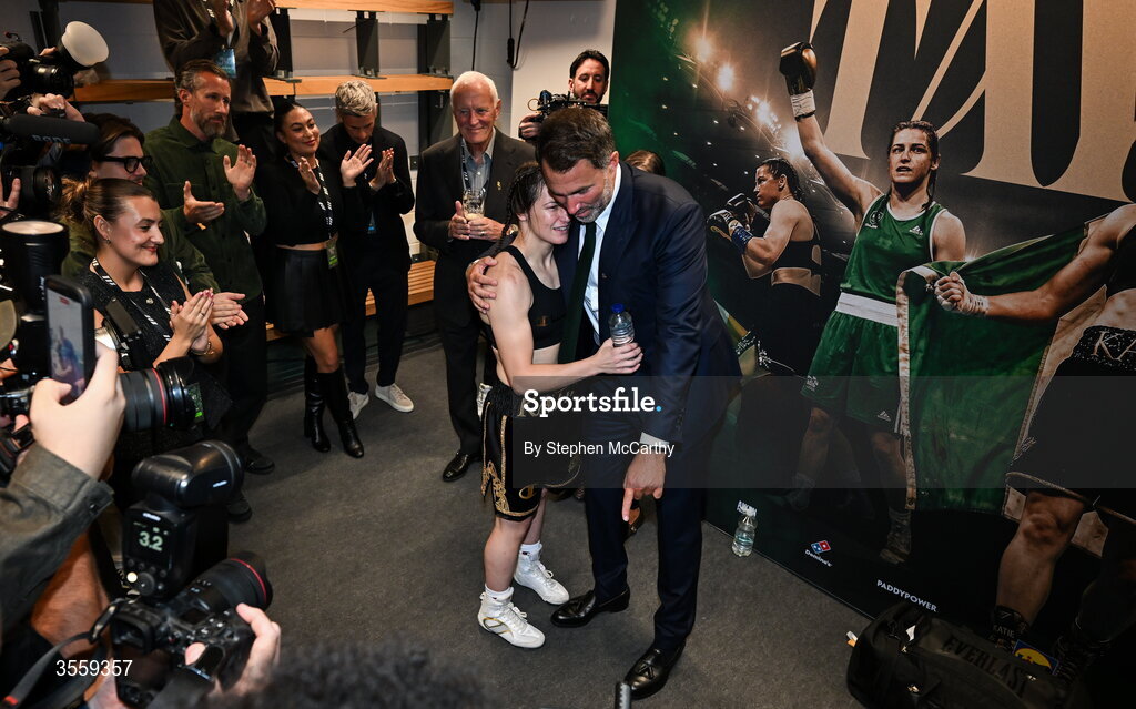 5 September 2026; Katie Taylor with Chairman of Matchroom Sports Eddie Hearn in her dressing room following her undisputed super lightweight championship fight victory over Flora Pili at the Once Upon A Time fight night in Croke Park, Dublin. Photo by Stephen McCarthy/Sportsfile