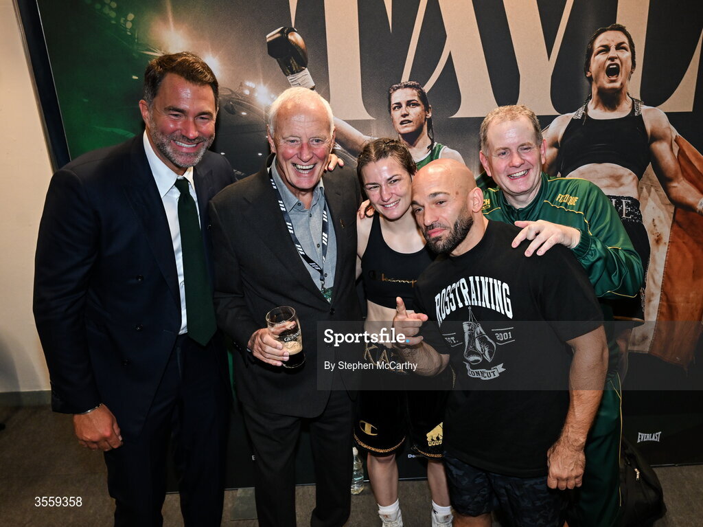 5 September 2026; Katie Taylor in her dressing room with, from left, Chairman of Matchroom Sports Eddie Hearn, President of Matchroom Sport Barry Hearn and trainer Ross Enamait following her undisputed super lightweight championship fight victory over Flora Pili at the Once Upon A Time fight night in Croke Park, Dublin. Photo by Stephen McCarthy/Sportsfile