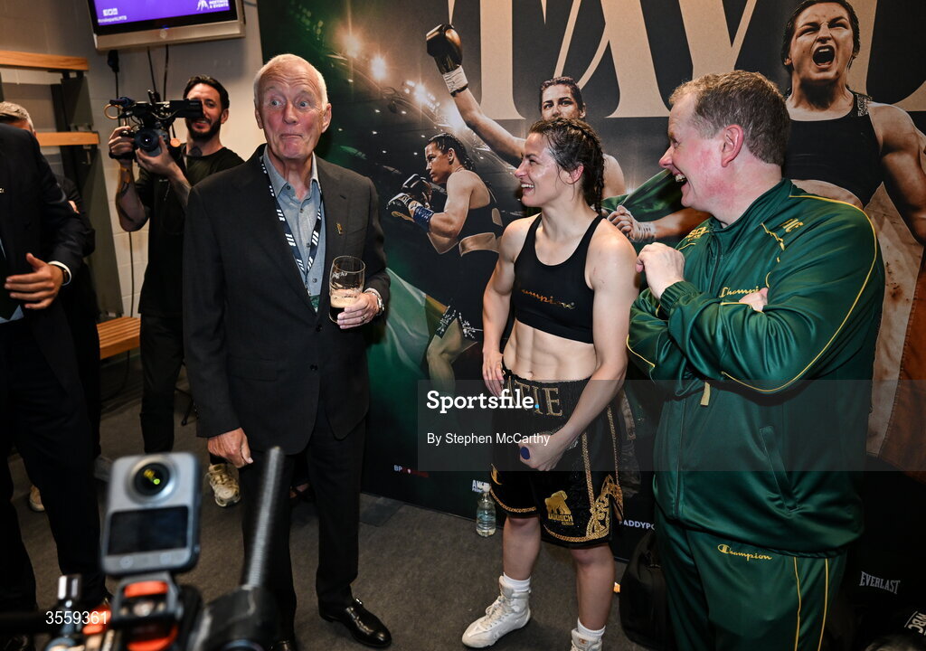 5 September 2026; Katie Taylor in her dressing room with President of Matchroom Sport Barry Hearn, left, and manager Brian Peters following her undisputed super lightweight championship fight victory over Flora Pili at the Once Upon A Time fight night in Croke Park, Dublin. Photo by Stephen McCarthy/Sportsfile
