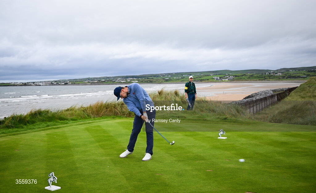 6 September 2026; Eliot Baker of Great Britain and Ireland watches his tee shot on the fourth hole during the morning foursomes on day two of the 51st Walker Cup at Lahinch Golf Club in Lahinch, Clare. Photo by Ramsey Cardy/Sportsfile