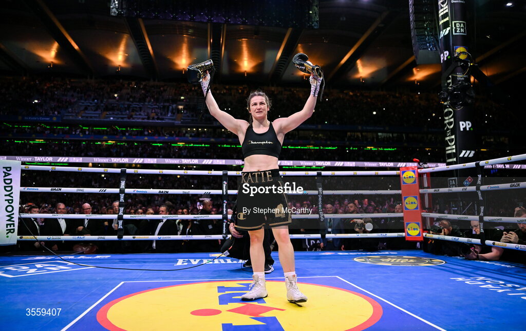 5 September 2026; Katie Taylor holds up her gloves following her undisputed super lightweight championship fight victory over Flora Pili, and her final fight, at the Once Upon A Time fight night in Croke Park, Dublin. Photo by Stephen McCarthy/Sportsfile