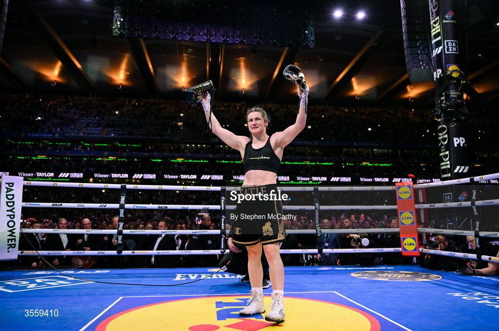 5 September 2026; Katie Taylor holds up her gloves following her undisputed super lightweight championship fight victory over Flora Pili, and her final fight, at the Once Upon A Time fight night in Croke Park, Dublin. Photo by Stephen McCarthy/Sportsfile