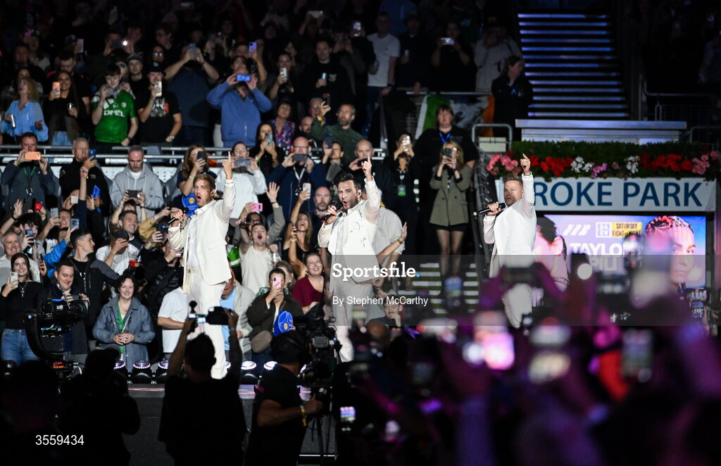 5 September 2026;  Nicky Byrne, left, Kian Egan, centre, and Shane Filan of Westlife perform ahead of the undisputed super lightweight championship fight between Katie Taylor and Flora Pili at the Once Upon A Time fight night in Croke Park, Dublin. Photo by Stephen McCarthy/Sportsfile