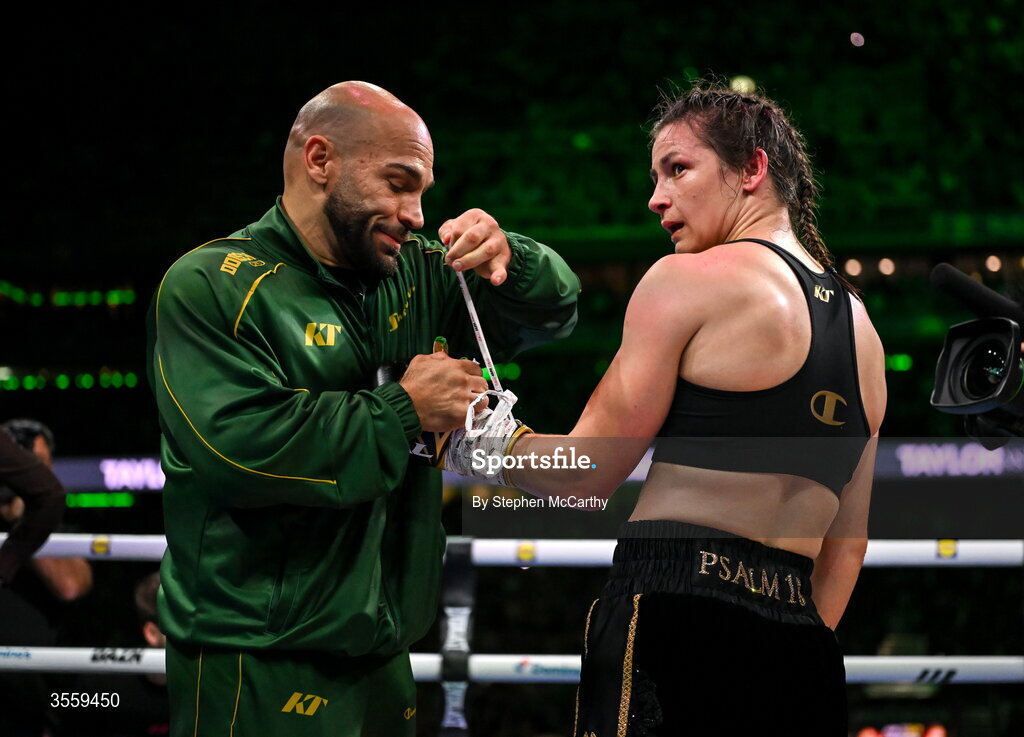 5 September 2026; Katie Taylor and trainer Ross Enamait following her undisputed super lightweight championship fight victory over Flora Pili at the Once Upon A Time fight night in Croke Park, Dublin. Photo by Stephen McCarthy/Sportsfile