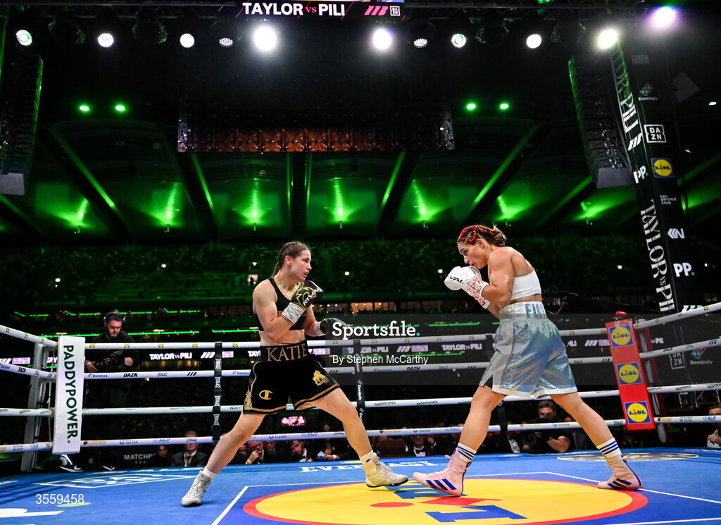 5 September 2026; Katie Taylor, left, and Flora Pili during their undisputed super lightweight championship fight at the Once Upon A Time fight night in Croke Park, Dublin. Photo by Stephen McCarthy/Sportsfile