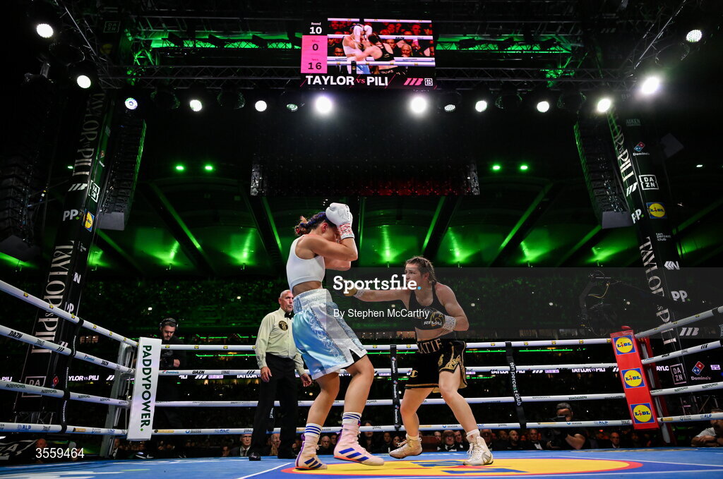 5 September 2026; Katie Taylor, right, and Flora Pili during their undisputed super lightweight championship fight at the Once Upon A Time fight night in Croke Park, Dublin. Photo by Stephen McCarthy/Sportsfile