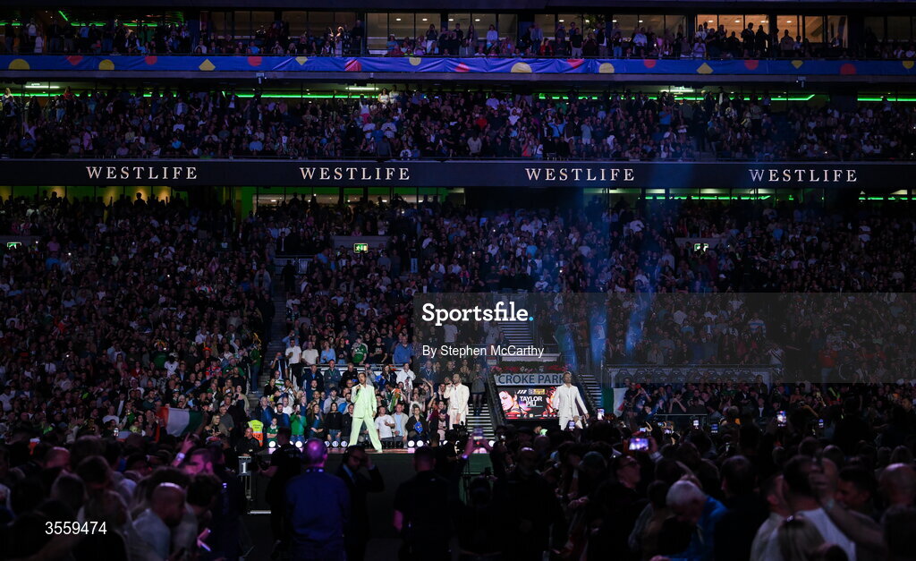 5 September 2026;  Nicky Byrne, left, Kian Egan, centre, and Shane Filan of Westlife perform ahead of the undisputed super lightweight championship fight between Katie Taylor and Flora Pili at the Once Upon A Time fight night in Croke Park, Dublin. Photo by Stephen McCarthy/Sportsfile