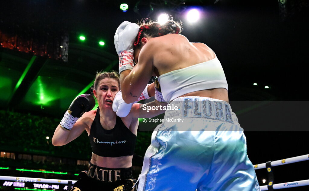 5 September 2026; Katie Taylor, left, and Flora Pili during their undisputed super lightweight championship fight at the Once Upon A Time fight night in Croke Park, Dublin. Photo by Stephen McCarthy/Sportsfile