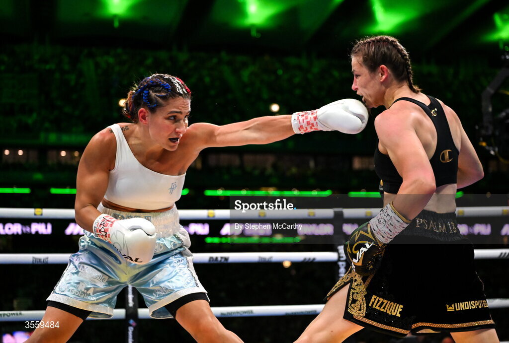 5 September 2026; Flora Pili, left, and Katie Taylor during their undisputed super lightweight championship fight at the Once Upon A Time fight night in Croke Park, Dublin. Photo by Stephen McCarthy/Sportsfile