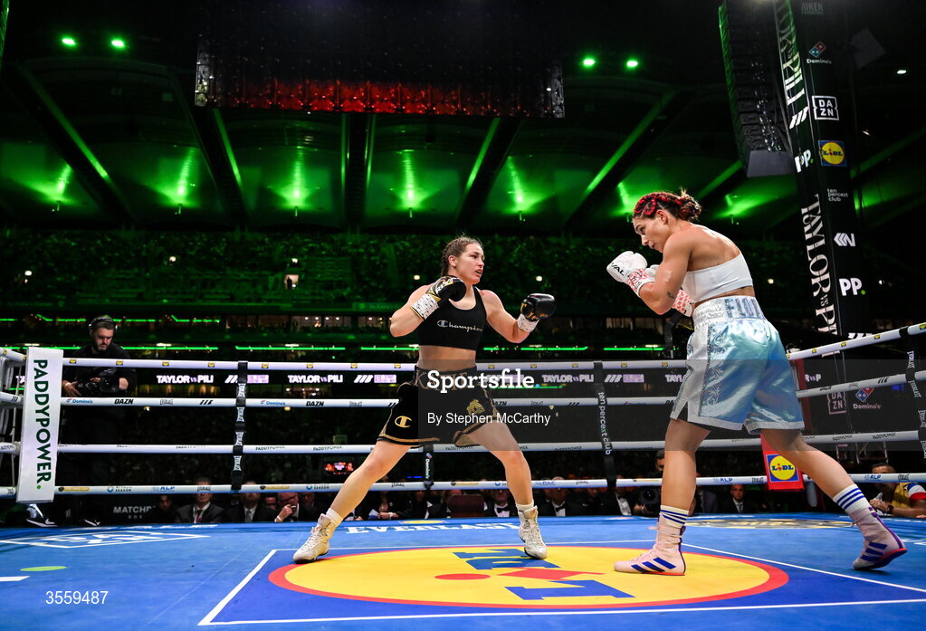 5 September 2026; Katie Taylor, left, and Flora Pili during their undisputed super lightweight championship fight at the Once Upon A Time fight night in Croke Park, Dublin. Photo by Stephen McCarthy/Sportsfile