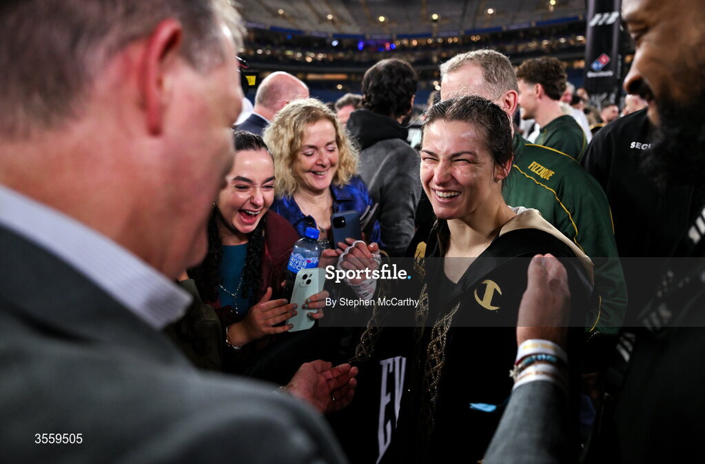 5 September 2026; Katie Taylor with boxing commentator Adam Smith after her undisputed super lightweight championship fight victory over Flora Pili at the Once Upon A Time fight night in Croke Park, Dublin. Photo by Stephen McCarthy/Sportsfile