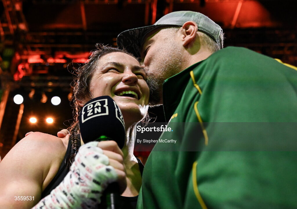 5 September 2026; Katie Taylor with her husband Sean McCavanagh after her undisputed super lightweight championship fight with Flora Pili at the Once Upon A Time fight night in Croke Park, Dublin. Photo by Stephen McCarthy/Sportsfile