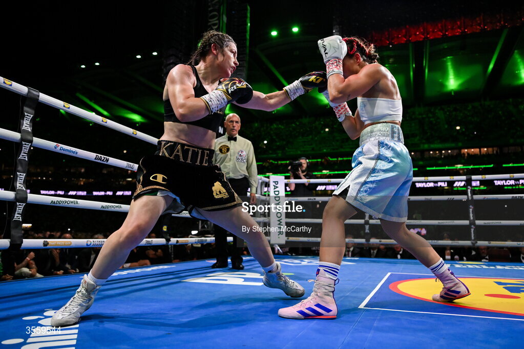 5 September 2026; Katie Taylor, left, and Flora Pili during their undisputed super lightweight championship fight at the Once Upon A Time fight night in Croke Park, Dublin. Photo by Stephen McCarthy/Sportsfile