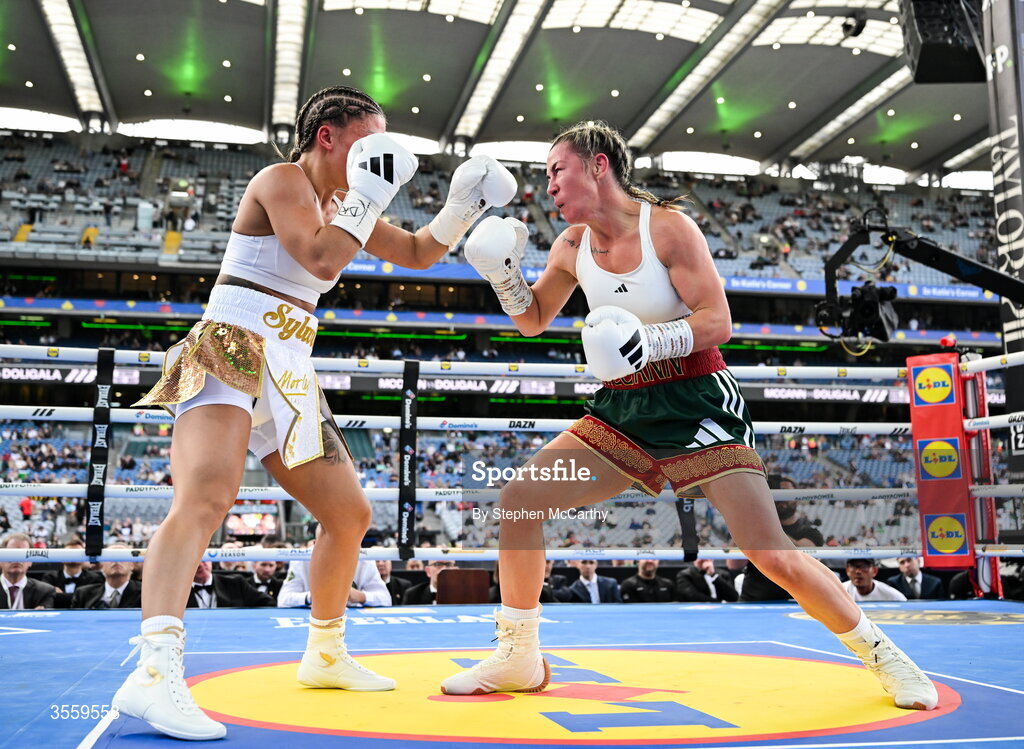 5 September 2026; Molly McCann, right, and Sylwia Doligala during their bantamweight bout at the Once Upon A Time fight night in Croke Park, Dublin. Photo by Stephen McCarthy/Sportsfile