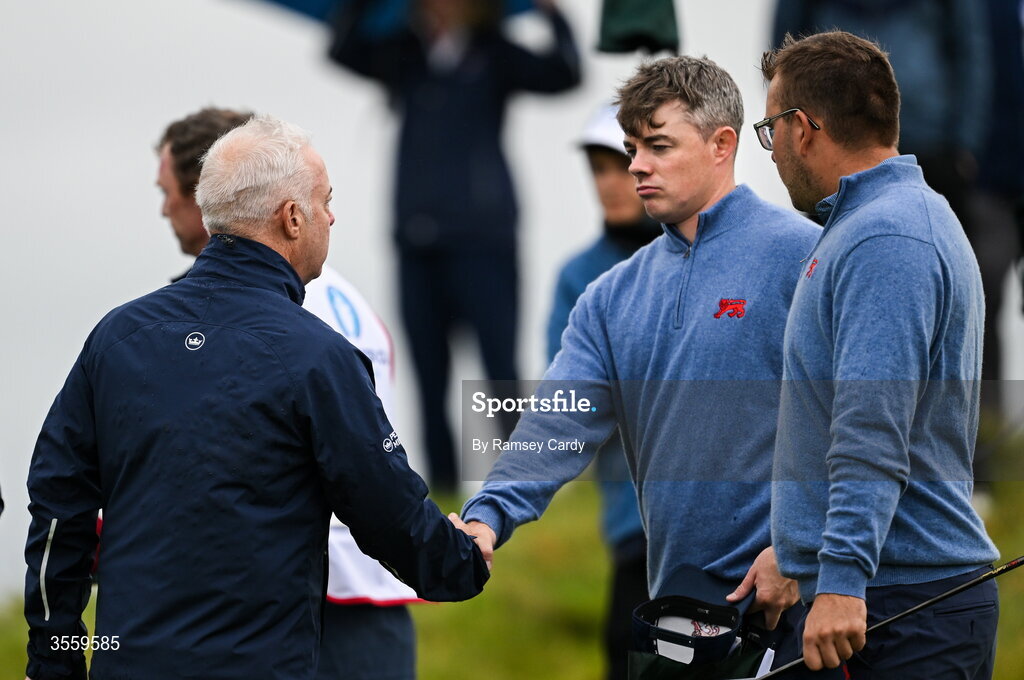 6 September 2026; Stuart Grehan of Great Britain and Ireland shakes hands with Great Britain and Ireland captain  Dean Robertson during the morning foursomes on day two of the 51st Walker Cup at Lahinch Golf Club in Lahinch, Clare. Photo by Ramsey Cardy/Sportsfile