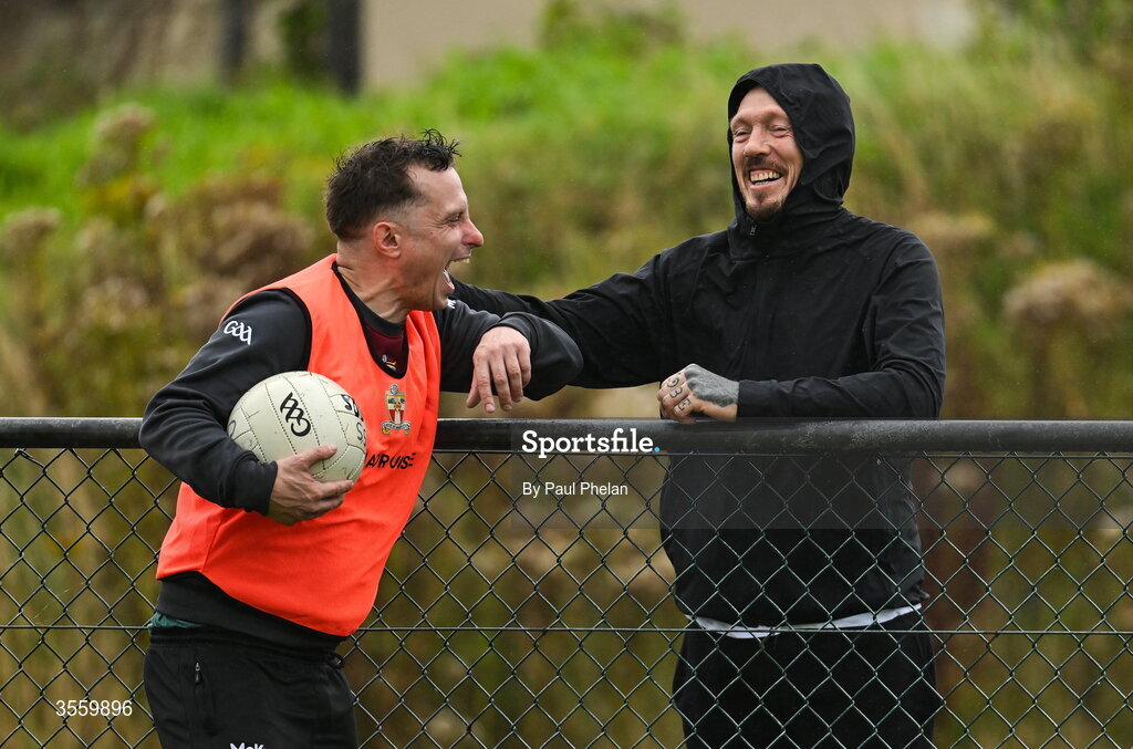 6 September 2026; Father of Kobe McDonald and former Mayo and Crossmolina Deel Rovers player Ciaran McDonald, right, laughs with a member of the Crossmolina Deel Rovers coaching staff before the Connacht Gold Senior Club Championship Group 3 match between Crossmolina Deel Rovers of Mayo and Mayo Gaels of Mayo at Charlestown Sarsfields GAA, Fr O'Hara Park, Charlestown in Mayo. Photo by Paul Phelan/Sportsfile
