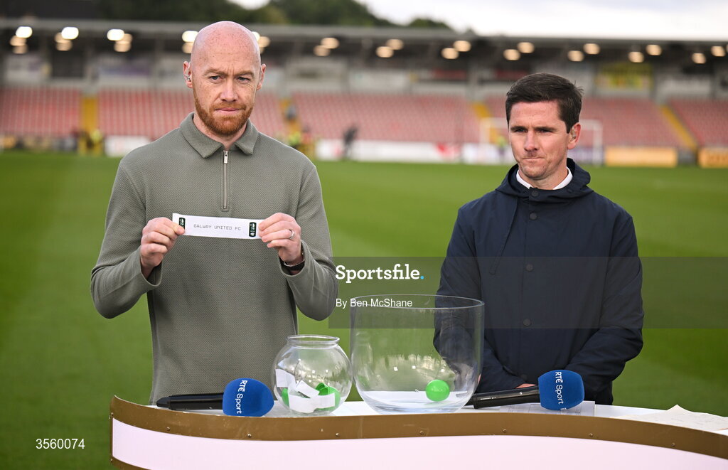 6 September 2026; Former Dundalk and current Linfield player Chris Shields, left, draws the name of Galway United in the Club Orange Men’s FAI Cup semi-final draw, in the company of former Derry City player Gareth McGlynn, after the Club Orange Men’s FAI Cup quarter-final match between Derry City and Dundalk at The Ryan McBride Brandywell Stadium in Derry. Photo by Ben McShane/Sportsfile