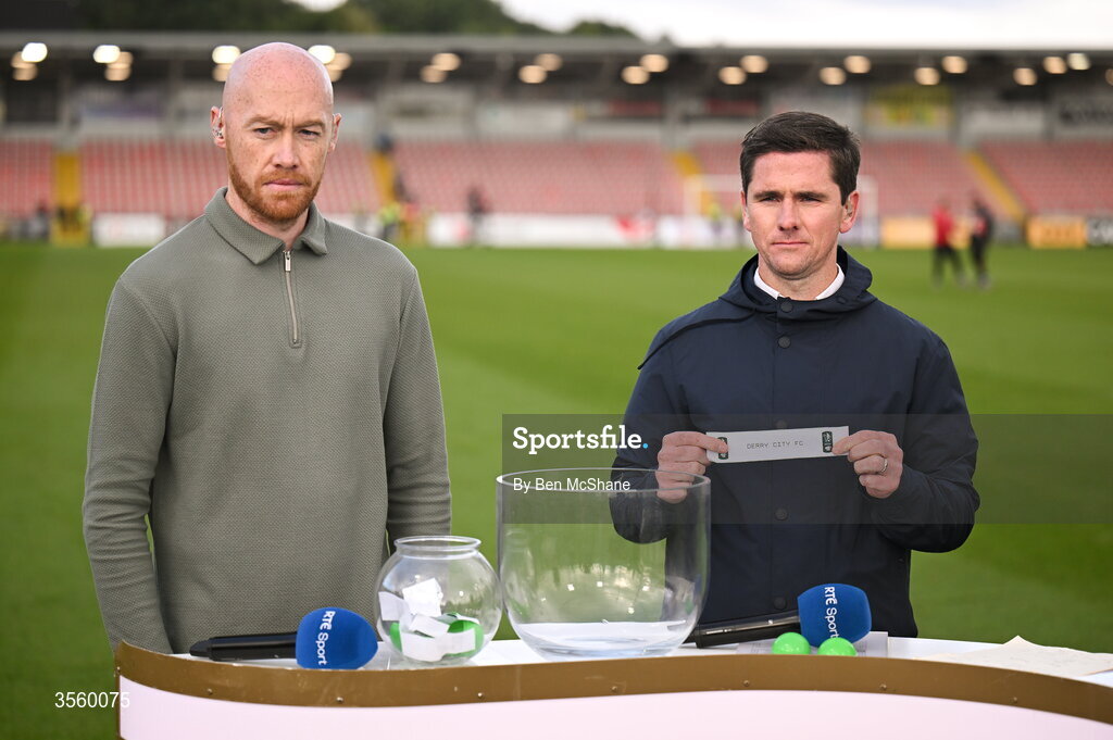 6 September 2026; Former Derry City player Gareth McGlynn, right, draws the name of Derry City in the Club Orange Men’s FAI Cup semi-final draw, in the company of Former Dundalk and current Linfield player Chris Shields, after the Club Orange Men’s FAI Cup quarter-final match between Derry City and Dundalk at The Ryan McBride Brandywell Stadium in Derry. Photo by Ben McShane/Sportsfile