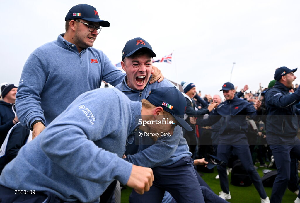 6 September 2026; Great Britain and Ireland players, from left, Eliot Baker, Stuart Grehan and Connor Graham celebrate winning The Walker Cup on day two of the 51st Walker Cup at Lahinch Golf Club in Lahinch, Clare. Photo by Ramsey Cardy/Sportsfile