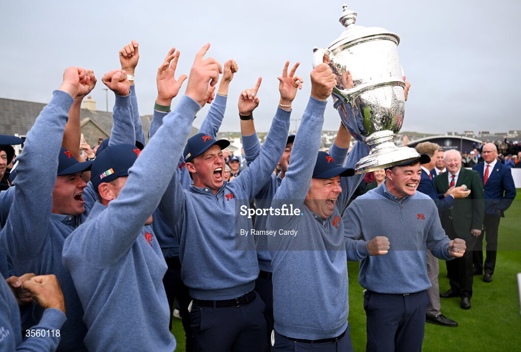 6 September 2026; Great Britain and Ireland captain Dean Robertson lifts The Walker Cup on day two of the 51st Walker Cup at Lahinch Golf Club in Lahinch, Clare. Photo by Ramsey Cardy/Sportsfile