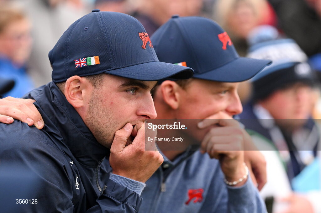 6 September 2026; Jack Whaley of Great Britain and Ireland watches on as Josh Hill of Great Britain and Ireland takes the winning putt on day two of the 51st Walker Cup at Lahinch Golf Club in Lahinch, Clare. Photo by Ramsey Cardy/Sportsfile