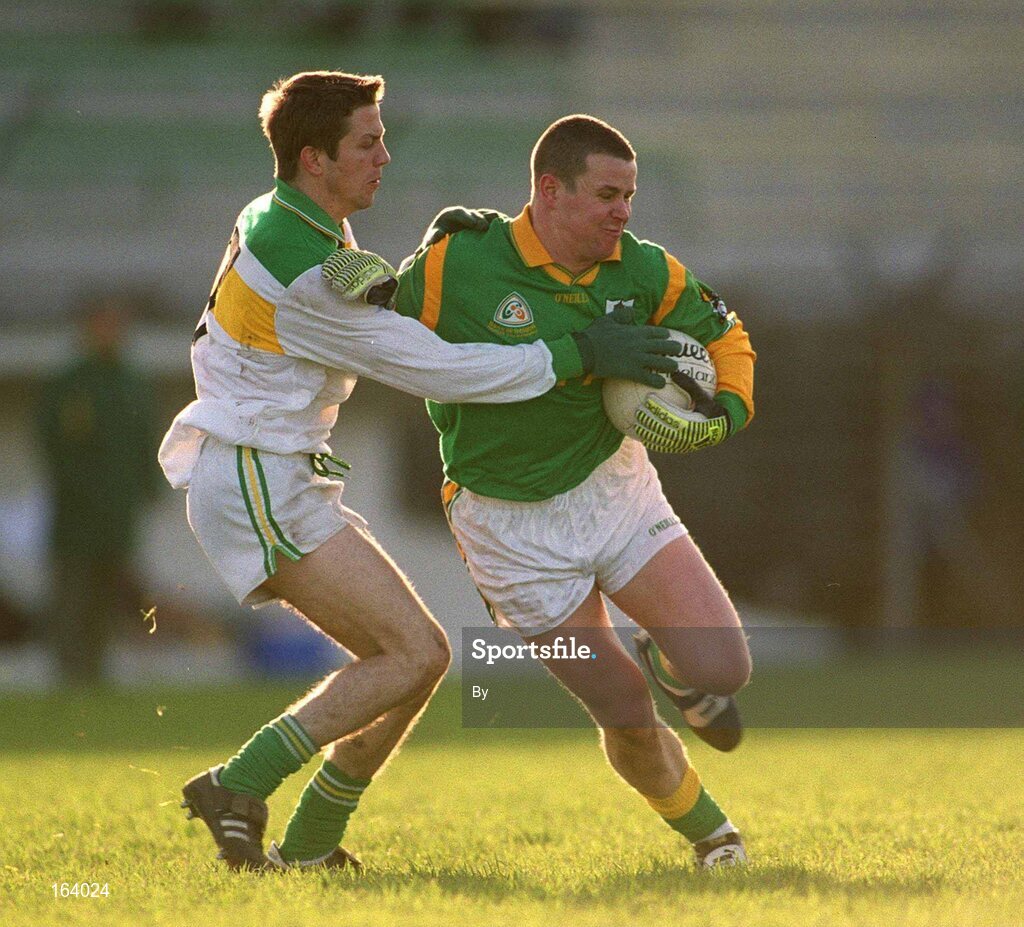 25 November 2001; Daithi Regan, Meath, in action against Karol Slattery, Offaly. Meath v Offaly, O'Byrne Cup, PAirc Tailteann, Navan. Football. Picture credit; Aoife Rice / SPORTSFILE