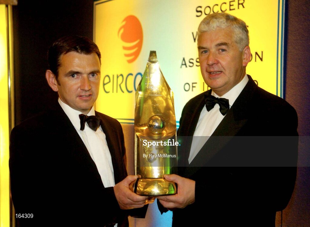15 January 2005; Cathal Magee, Managing Director, eircom Retail, presents the eircom / Soccer Writers Association of Ireland 'Personality of the Year' award to Shelbourne manager Pat Fenlon. eircom / SWAI Personality of the Year Award, Rochestown Park Hotel, Rochestown, Cork. Picture credit; Ray McManus / SPORTSFILE