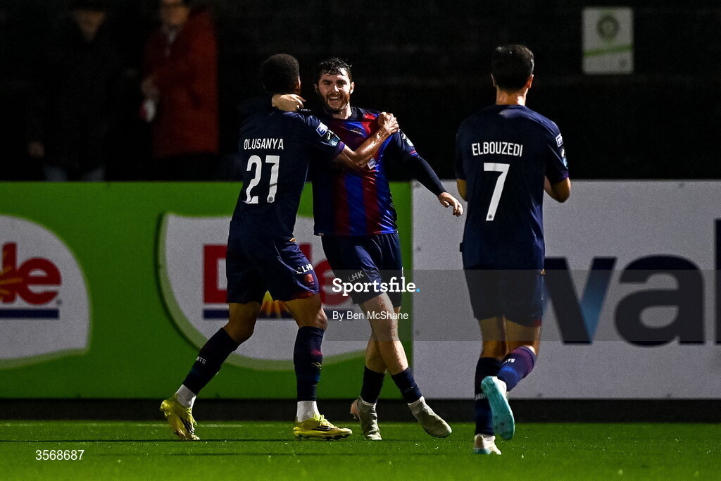 14 September 2026; Aidan Keena of St Patrick's Athletic, centre, celebrates with teammates Anthony Olusanya, left, and Zack Elbouzedi after scoring their side's first goal during the SSE Airtricity Men’s Premier Division match between Dundalk and St Patrick's Athletic at Oriel Park in Dundalk, Louth. Photo by Ben McShane/Sportsfile