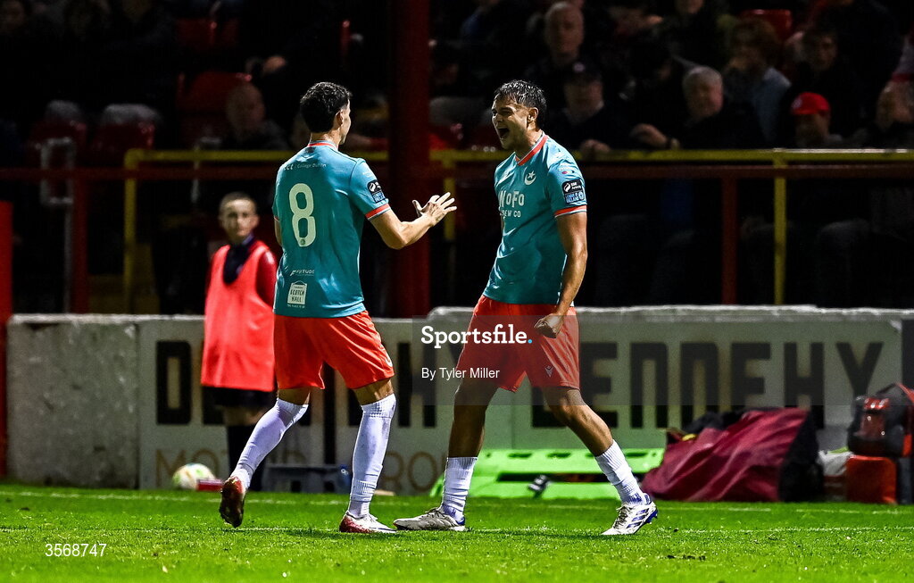 14 September 2026; Leo Burney of Drogheda United, right, celebrates with teammate Ethan O'Brien after scoring their side's second goal during the SSE Airtricity Men’s Premier Division match between Shelbourne and Drogheda United at Tolka Park in Dublin. Photo by Tyler Miller/Sportsfile