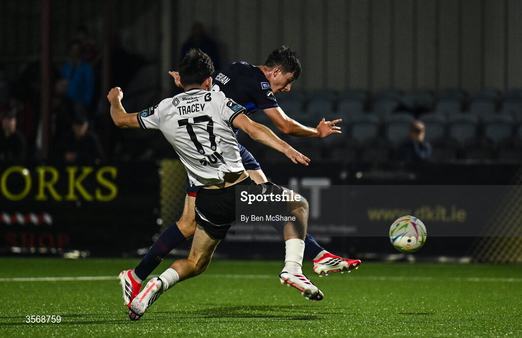 14 September 2026; Ryan Sheridan of St Patrick's Athletic scores his side's third goal despite the attention of Shane Tracey of Dundalk during the SSE Airtricity Men’s Premier Division match between Dundalk and St Patrick's Athletic at Oriel Park in Dundalk, Louth. Photo by Ben McShane/Sportsfile