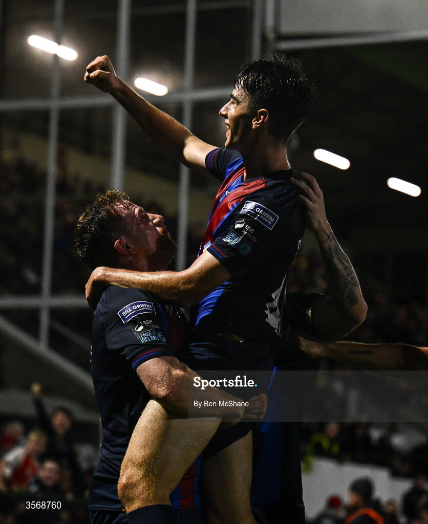 14 September 2026; Ryan Sheridan of St Patrick's Athletic celebrates with teammate Sean Hoare, bottom, after scoring their side's third goal during the SSE Airtricity Men’s Premier Division match between Dundalk and St Patrick's Athletic at Oriel Park in Dundalk, Louth. Photo by Ben McShane/Sportsfile