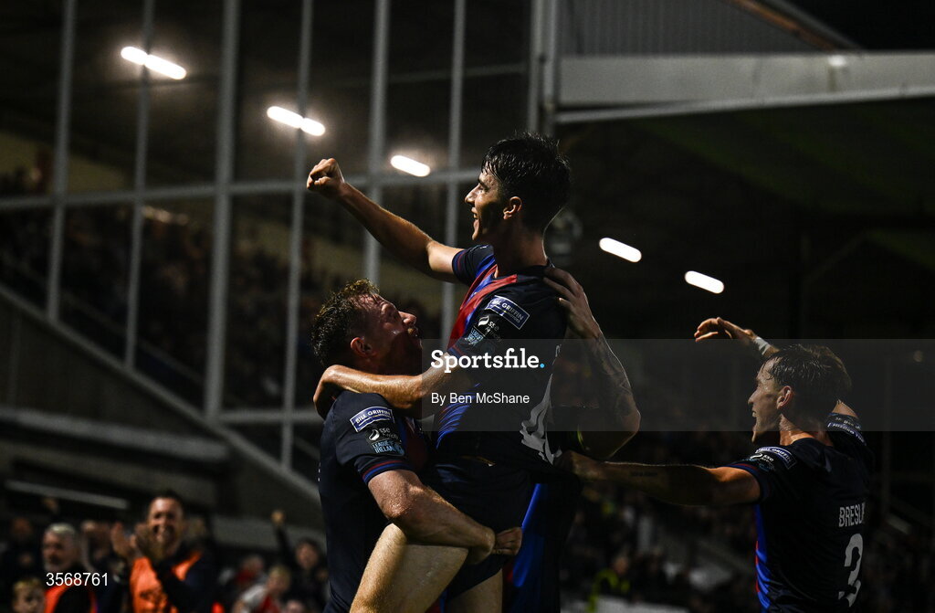 14 September 2026; Ryan Sheridan of St Patrick's Athletic celebrates with teammate Sean Hoare, bottom, after scoring their side's third goal during the SSE Airtricity Men’s Premier Division match between Dundalk and St Patrick's Athletic at Oriel Park in Dundalk, Louth. Photo by Ben McShane/Sportsfile