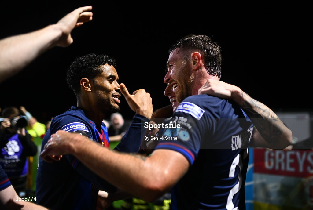 14 September 2026; Ryan Edmondson of St Patrick's Athletic celebrates with teammates Joe Redmond, centre, and Romal Palmer after scoring their side's fourth goal during the SSE Airtricity Men’s Premier Division match between Dundalk and St Patrick's Athletic at Oriel Park in Dundalk, Louth. Photo by Ben McShane/Sportsfile