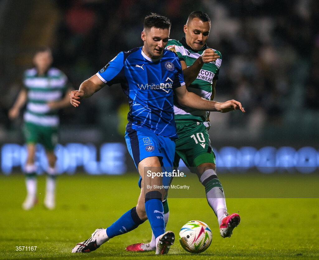 18 September 2026; Hayden Cann of Waterford in action against Graham Burke of Shamrock Rovers during the SSE Airtricity Men’s Premier Division match between Shamrock Rovers and Waterford at Tallaght Stadium in Dublin. Photo by Stephen McCarthy/Sportsfile
