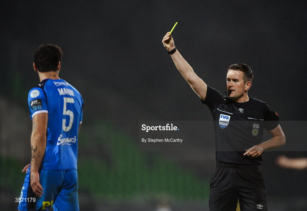 18 September 2026; John Mahon of Waterford is shown a yellow card by referee Aaron O'Dowd during the SSE Airtricity Men’s Premier Division match between Shamrock Rovers and Waterford at Tallaght Stadium in Dublin. Photo by Stephen McCarthy/Sportsfile