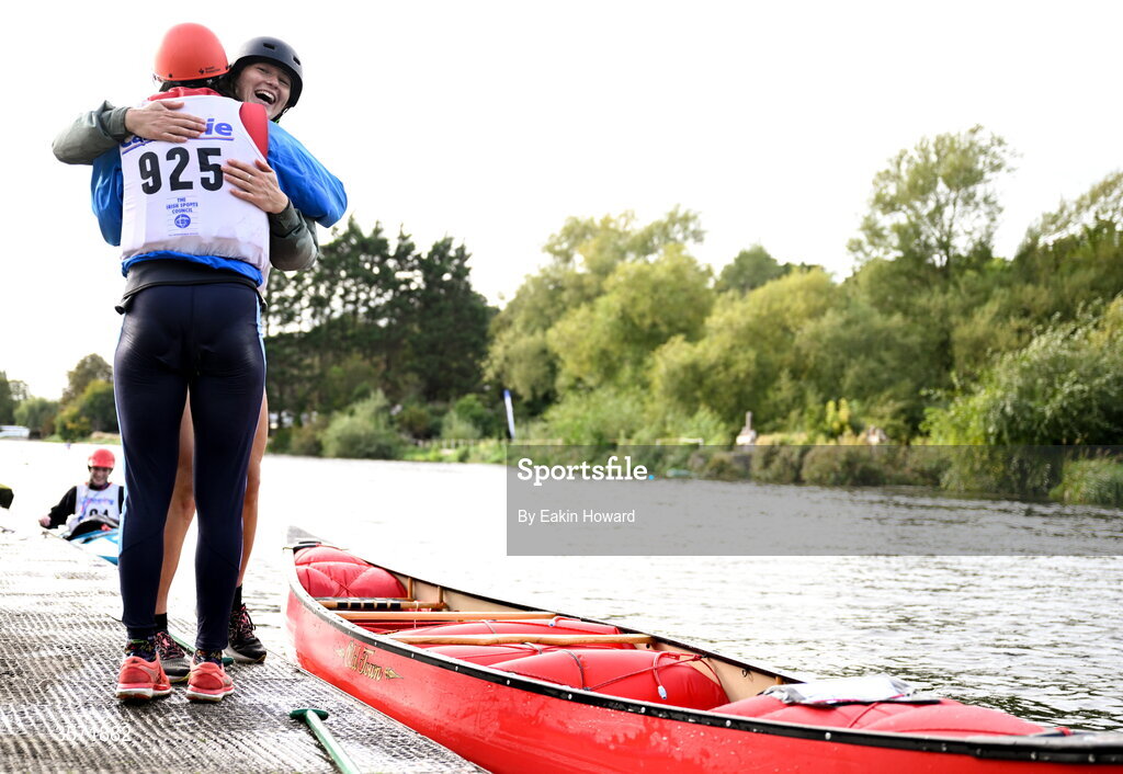 19 September 2026; Ava Evans and Claire Martin hug after competing in the Womens Canoe Doubles Canadian Canoe event competition during the 65th International Liffey Descent at Dublin University Boat Club in Kilmainham, Dublin. Photo by Eakin Howard/Sportsfile