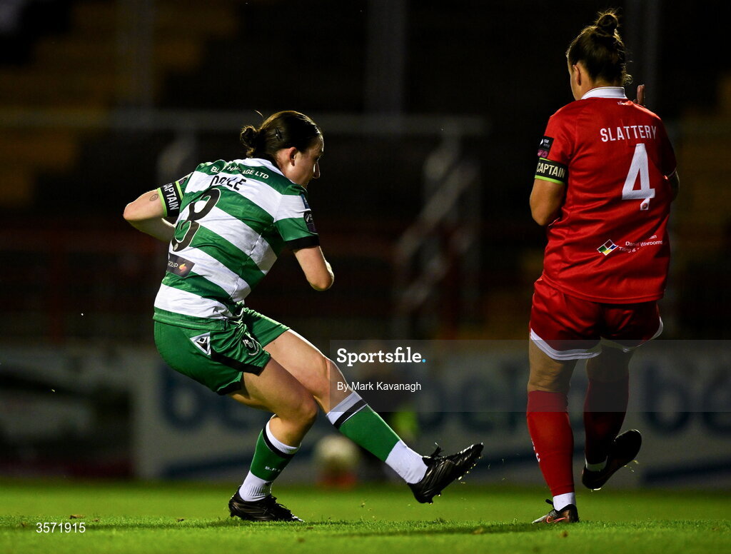 19 September 2026; Sadhbh Doyle of Shamrock Rovers shoots to score her side's first goal despite pressure from Pearl Slattery of Shelbourne during the SSE Airtricity Women's Premier Division match between Shelbourne and Shamrock Rovers at Tolka Park in Drumcondra, Dublin. Photo by Mark Kavanagh/Sportsfile